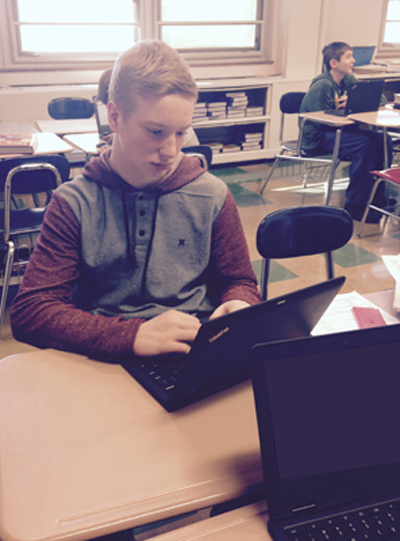 Freshman Andrew Lucas works on a Chromebook to prepare for the PARCC test.