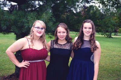 McCarty, Graf, and Glimbert attended Revere High Schools Homecoming together.