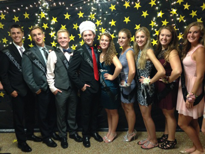 Members of the Homecoming court prepare for the evening.