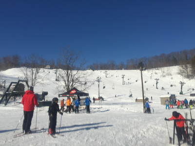 Skiers and snowboarders enjoy fresh snow. 