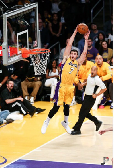 Nance+jumps+to+dunk+a+basketball.