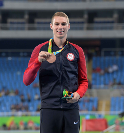 Murphy poses with his medal.