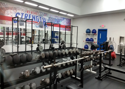 Weight lifters are able to work  in the newly-renovated Revere weight room. 