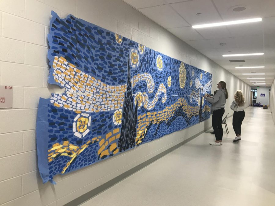 Revere Class Council decorates the hallway with a “Starry Night” banner, created by the Art Club.