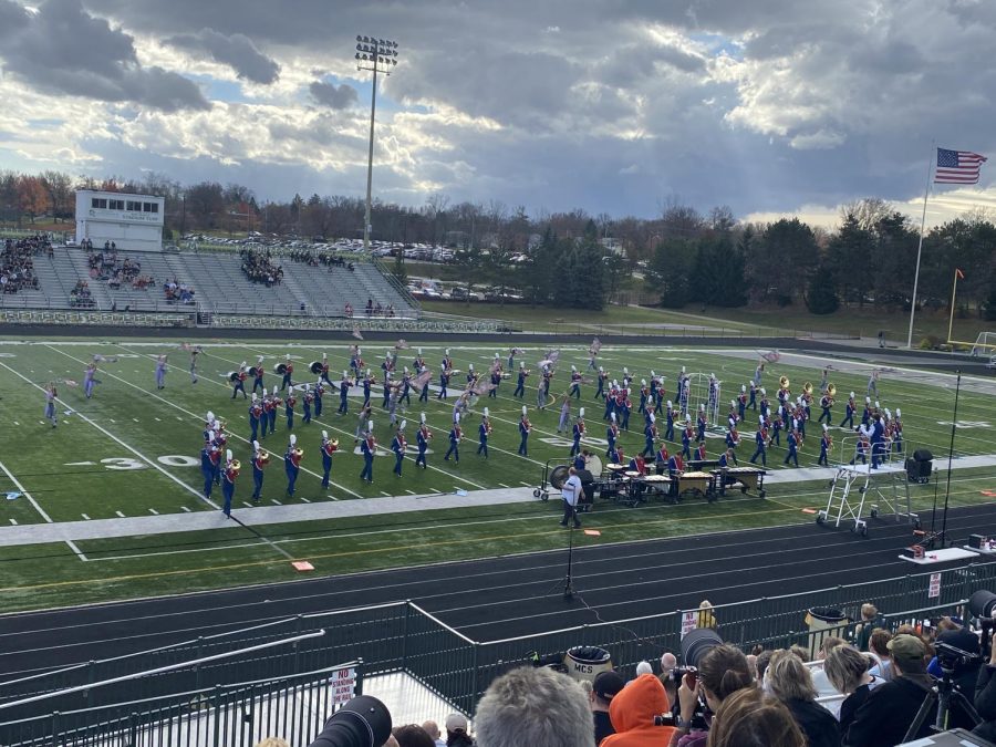 The marching band performs at the state competition. 