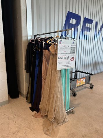 White added a rack of formal attire to the cafeteria, allowing students to easily look at what they offer. 