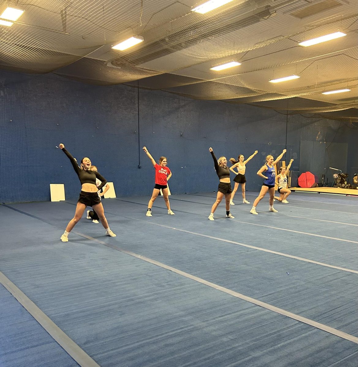 The competition squad practices their routine in preparation for the next competition. 