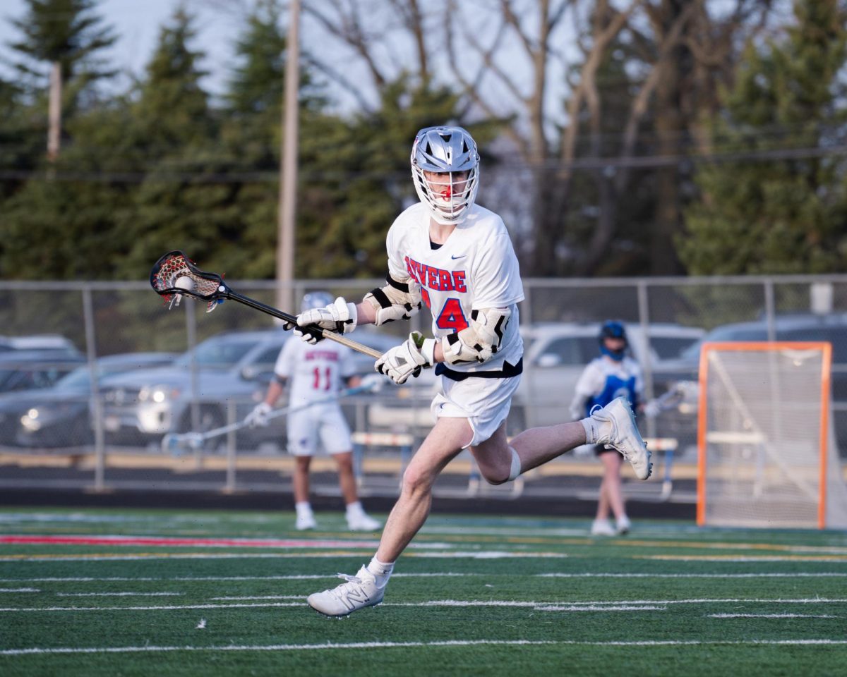 Jack Repie moves the ball down field during the Revere vs. CVCA game.