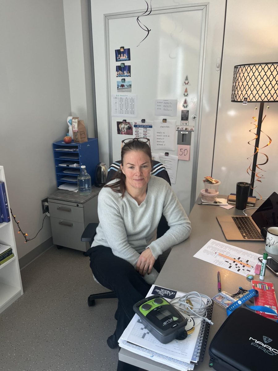 French teacher Diane Gerspacher sits at her desk in her RHS classroom. 