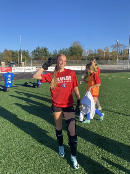 Abby Thomas stands at soccer practice on the RHS field. 