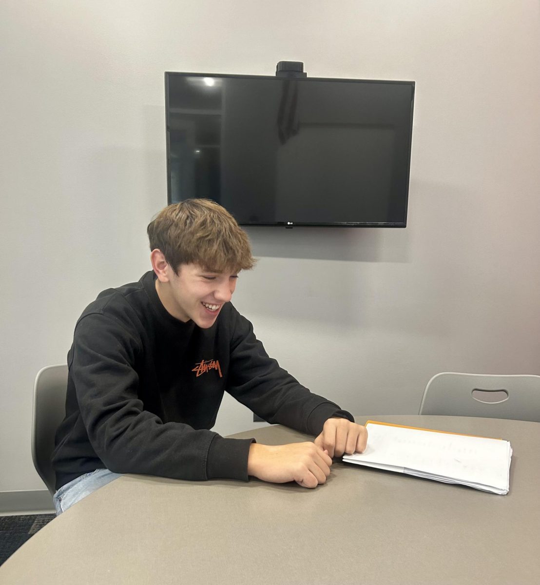 Thomas Salvotelli sits in an RHS common room during his time in America. 