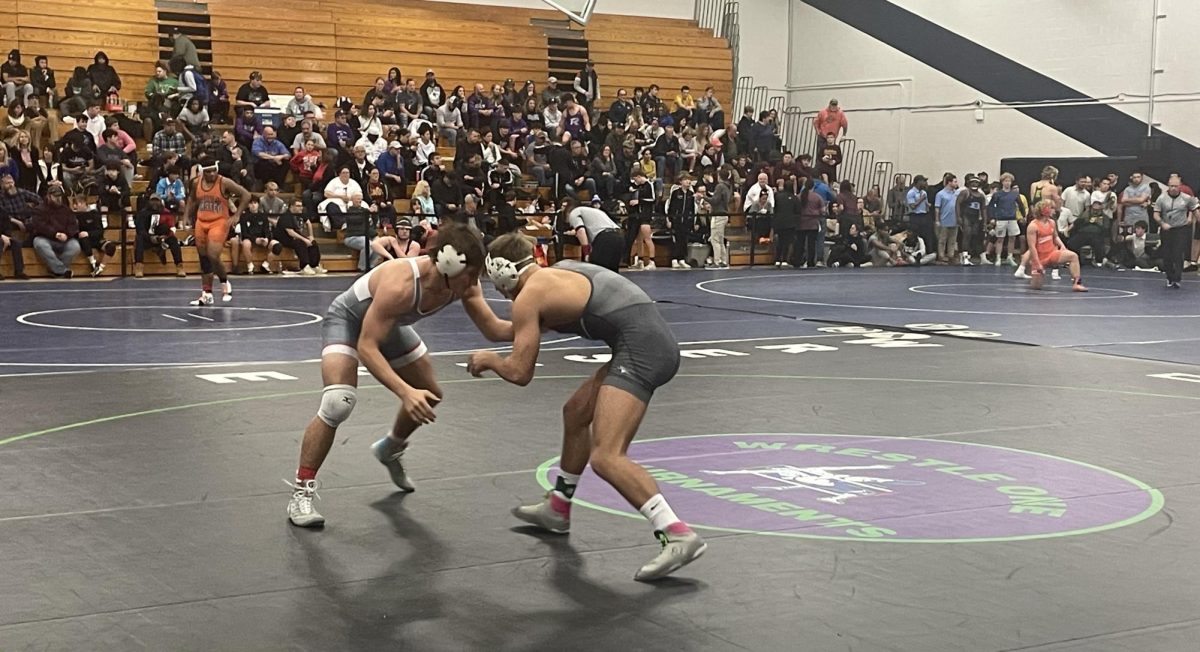 Jocek wrestles an opponent during a Suburban League match at Solon