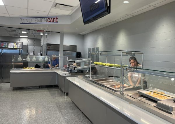 Staff prepare food before lunch service in the RHS cafeteria.