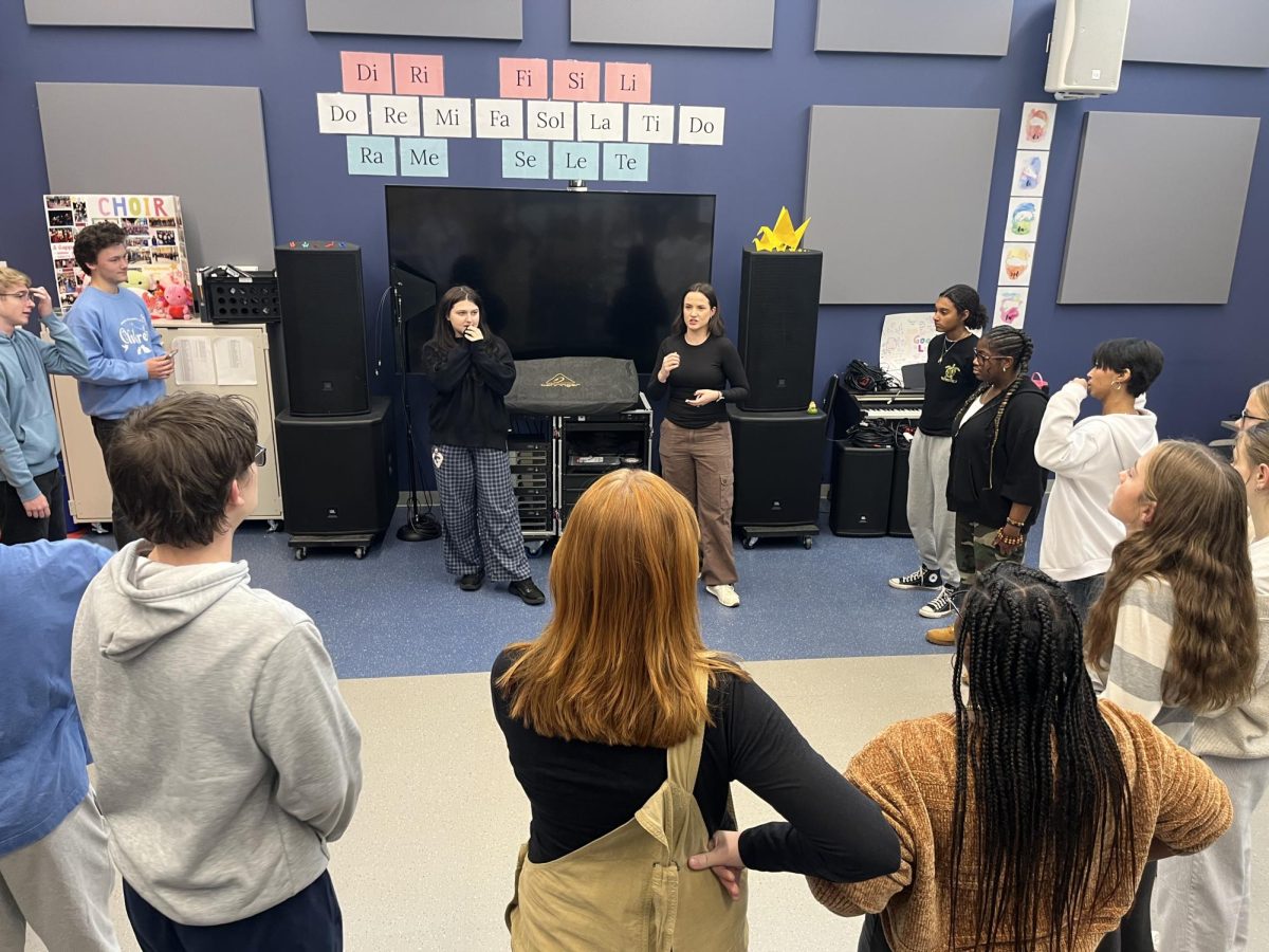 Revere’s Reverse A Capella practiced their Kettering performance before the festival.