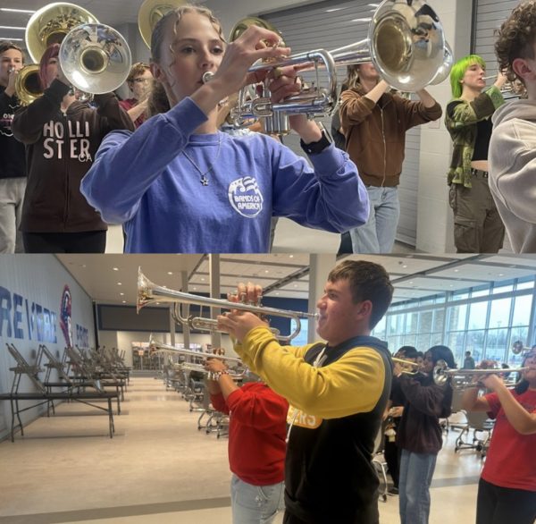 Junior Avery Smith and sophomore Chad Carpenter practice their instruments at RHS.