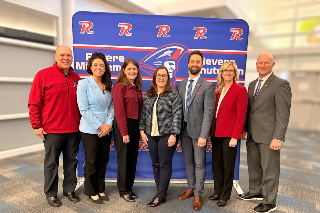 The Revere Board of Education poses for a picture for the Revere website.