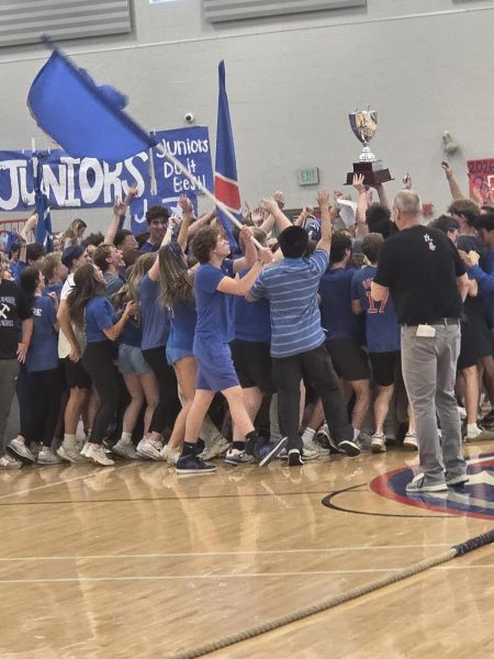 The junior class celebrates their Class Day victory at the afternoon assembly on May 1.